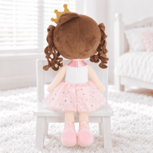Chestnut haired doll on white chair