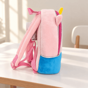 Pink and cyan plush backpack profile