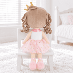 Plush doll's rear view on white chair